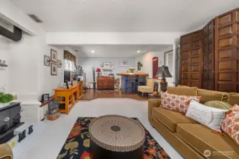 Down stairs rec room has a wood burning stove and wet bar for entertaining. Potentially this area could be turned into a multi generational living space.