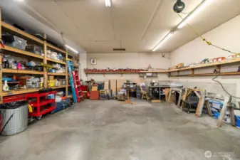 24 x 40 shop/garage if fully finished and the upright heater stays for your added cold weather comfort.