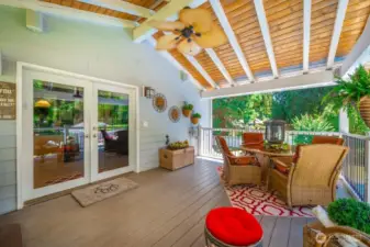 14 x 18 covered deck is built of reclaimed steel, natural wood ceiling with a ceiling fan.  The railings are made of iron  with an industrial feel with easy maintenance. With its covered roof you can enjoy this area during every season.