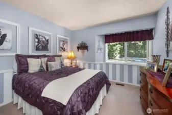 Secondary bedroom is spacious with plenty of light from the large front facing window and nice closet.