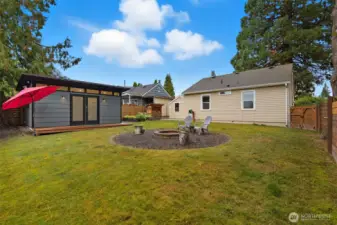 Enjoy evenings around the firepit in this thoughtfully designed outdoor space