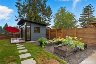 A gardener’s dream: raised beds for fresh produce, flowers, or creative planting.