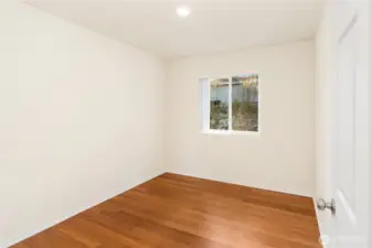 Second bedroom w/ closet to left.