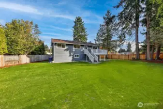 Fresh landscaping. This spacious yard has confirmed eligibility under renton's Permit-Ready ADU program. On the other side of the fence is a curb cut with ready separate access.