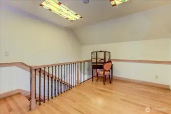 Second floor room with custom sky lights.