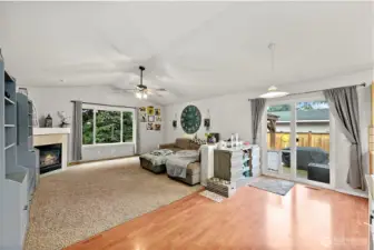 Light-filled open layout with vaulted ceilings that create an inviting sense of space.