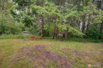 back end of property. Well house in view.