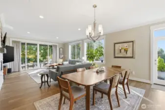 The dining area is perfectly situated between the kitchen and family room, creating a seamless flow for everyday living and entertaining. This open, connected space makes gatherings effortless and keeps everyone close to the heart of the home.