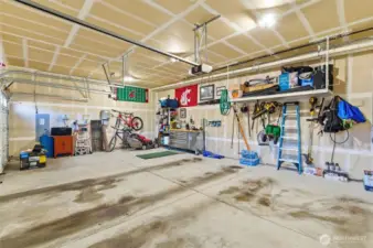 The 3-car garage offers ample space for vehicles, storage, and an EV charging plug, combining convenience with modern functionality. Designed for organization and efficiency, it’s perfect for both everyday living and hobby needs.