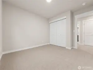 3rd bedroom.  Actual home is under construction and materials, colors, and finishes will vary. See site agent for details.