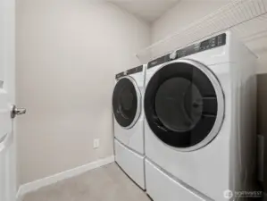Utility room on the 2nd level. Actual home is under construction and materials, colors, and finishes will vary. See site agent for details.