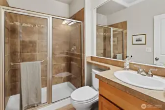 Downstairs 3/4 bath perfect for guests and multi-generational living