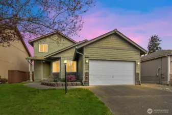 Spacious Garage with Abundant Shelving, Offering Exceptional Storage and Organization
