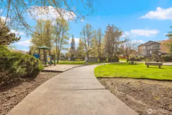 Community Amenities Include a Beautifully Landscaped Park with 2 Playgrounds