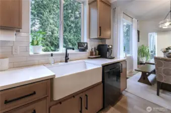 Another view of the kitchen and greenbelt