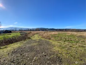 Rock-fill road into leveled area