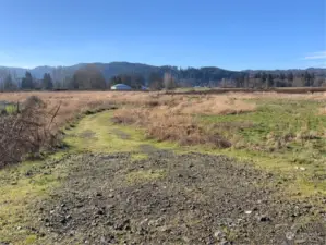 Rock-fill road into leveled area