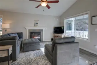 Living area has a warm and inviting propane fireplace.