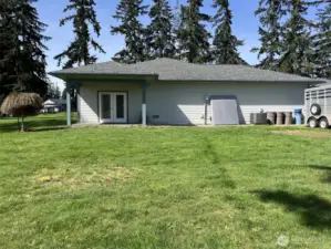 Side of home, french doors with patio