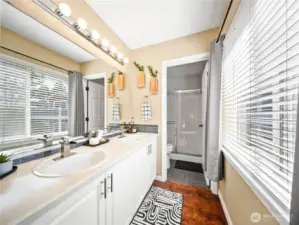 Primary ensuite  with double vanity and double shower.
