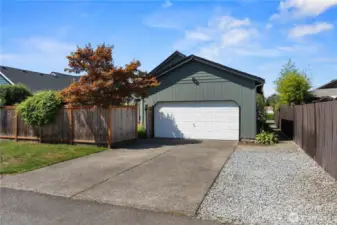 Garage and driveway are accessible from the alley