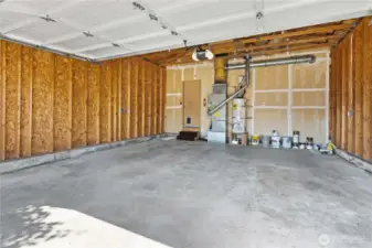 Garage is clean and well equipped with newer furnace and hot water tank.