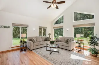 Another perspective of this large living room highlights the seamless flow of the home, creating an open and inviting atmosphere perfect for everyday living and entertaining.