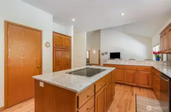 Kitchen has plenty of cabinet space along with beautiful quartz countertops.