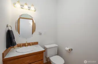 Half bathroom located at the center of the home, great for guests!
