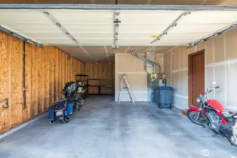 Extra deep garage bay for 3rd car or shop space!