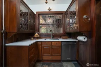 The scullery is also the passage way to the elevator & formal dining room.