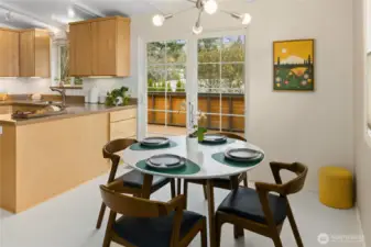 Dining area connected to large deck for indoor/outdoor dining