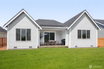 Spacious Rear yard w/ full fencing and a gate.
