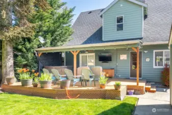 No need to ever leave home. The backyard is private, and the deck is covered to enjoy in any kind of weather. Relax in the hot tub and let the day melt away. Warm white outdoor lights create an ambient glow perfect for outdoor entertaining.