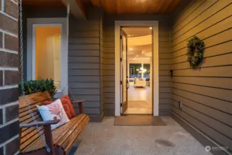 Inviting covered entry porch, complete with swing!