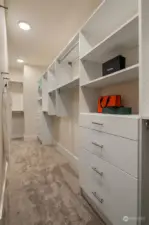 Large walk-in closet, complete with custom organizers