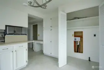 View of the kitchen from the extra eating area shows the laundry room for your washer & dryer.