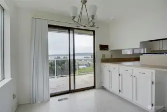 Kitchen eating area with great views of the community, and sliding door access to the view deck.