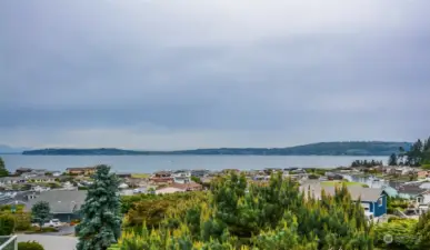 180 degree view of Saratoga Passage, the Cascade Mountain Range and the mariners Cove community.