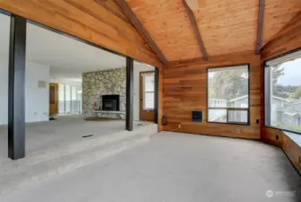 This view of the living room gives you a better idea on the setup of the room along with all of its features, and the location from the front entry..