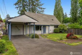 Lush green location, sweet neighborhood nook, a garage + carport + mutliple off-street parking spots.