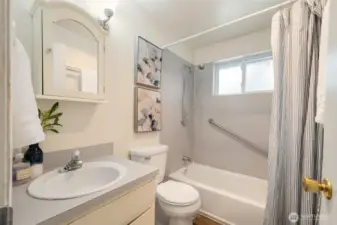 A bathroom with a tub and shower on the main floor + a bathroom on the 2nd level with a shower - how convenient is that?
