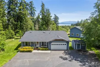 Acreage, shop, water view! What else could you need?