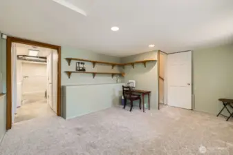 Downstairs office. Doorway on the left leads to large laundry room and storage area (Costco Room or natural wine cellar, perhaps?)