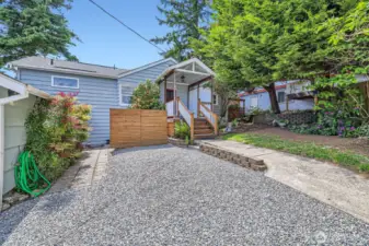 Beautiful lush and mature landscaping, with numerous lilac trees and a variety of colorful flowers. You'll love the gardens here!