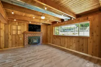 Brick Hearth & Wood Burning Insert keeps the Entire Home Cozy & Warm on the Cooler temps of Fall & Winter~Flat Screen TV is Included in the Sale~Movie Nights @ Home~