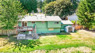 Closer View of the Back of the Home & Yard~Shed for Lawn & Yard Tools to Remain with the Home~New Roof with Timberline~Stain Guard~Weather Watch Shingles~Transferrable Warranty~Guarantee~