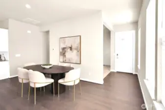 Dining area flows effortlessly between kitchen and living room.