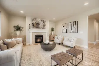 Living room to gather before the fireplace.