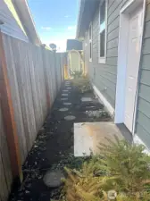 Walkway along side of home